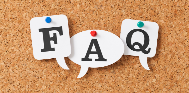 A corkboard with FAQ in individual speech bubbles pinned to the board
