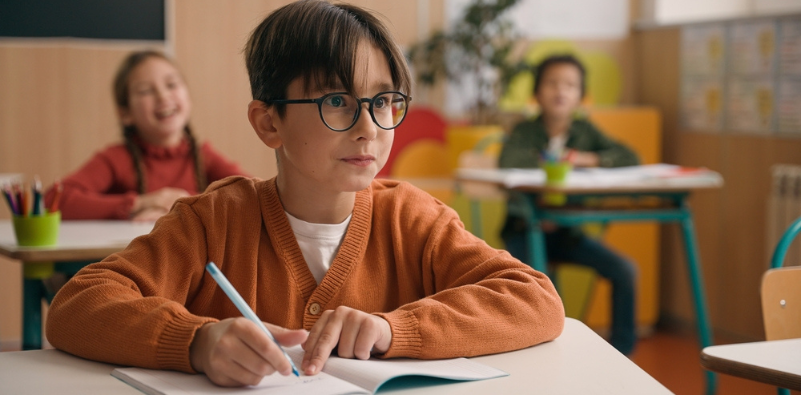 Young boy wearing glasses